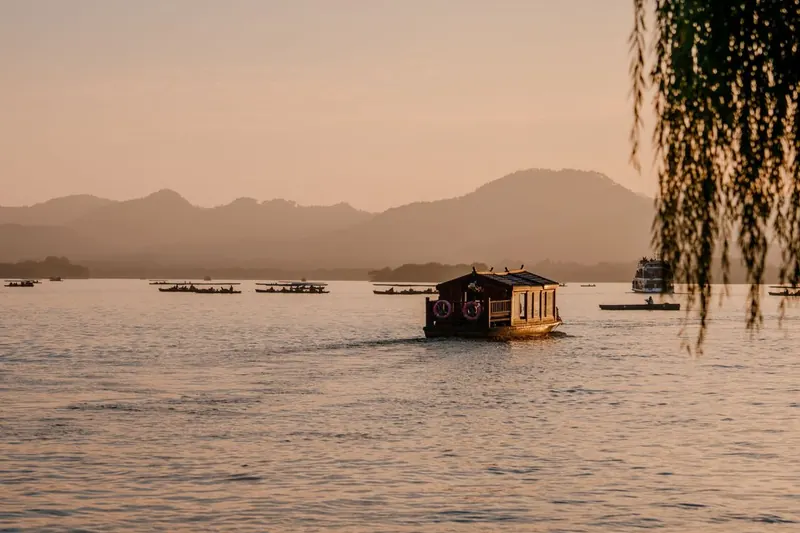 Houseboat at sunset on the Kerala backwaters
