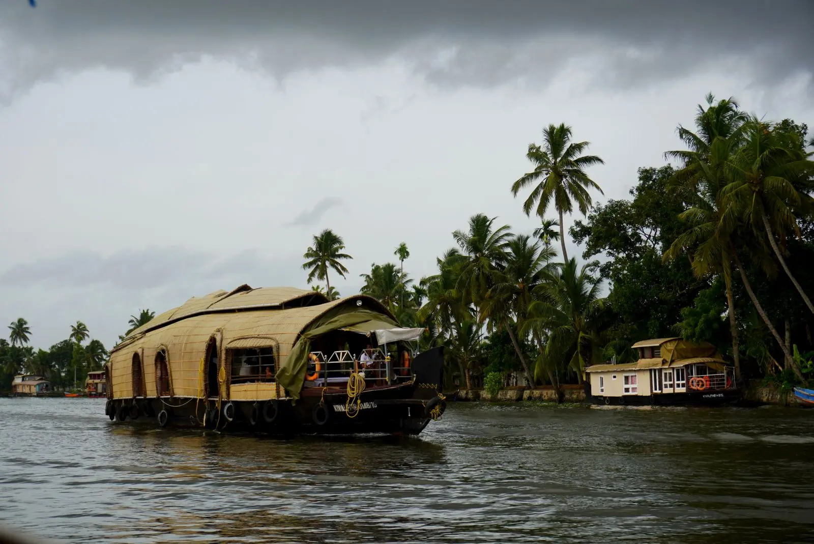 A traditional Kerala houseboat on the Alleppey backwaters at golden hour