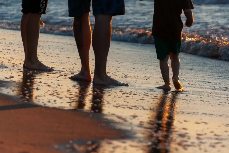 A family on a Kerala beach