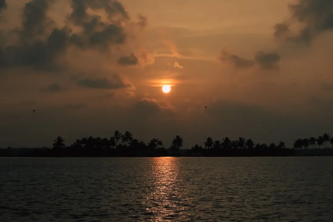 Sunset over Vembanad lake at Kumarakom
